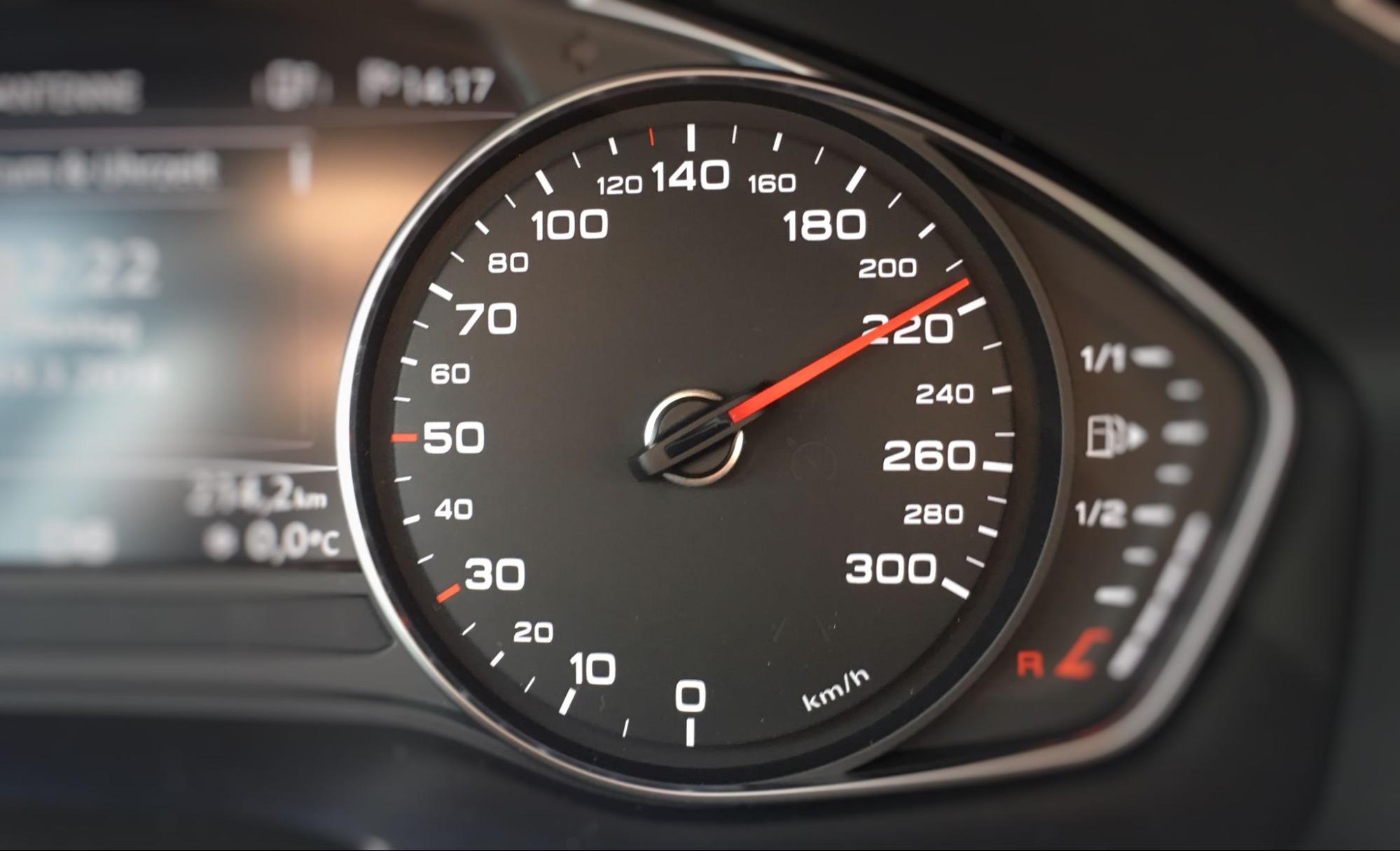 photo of speedometer going over 220km/h