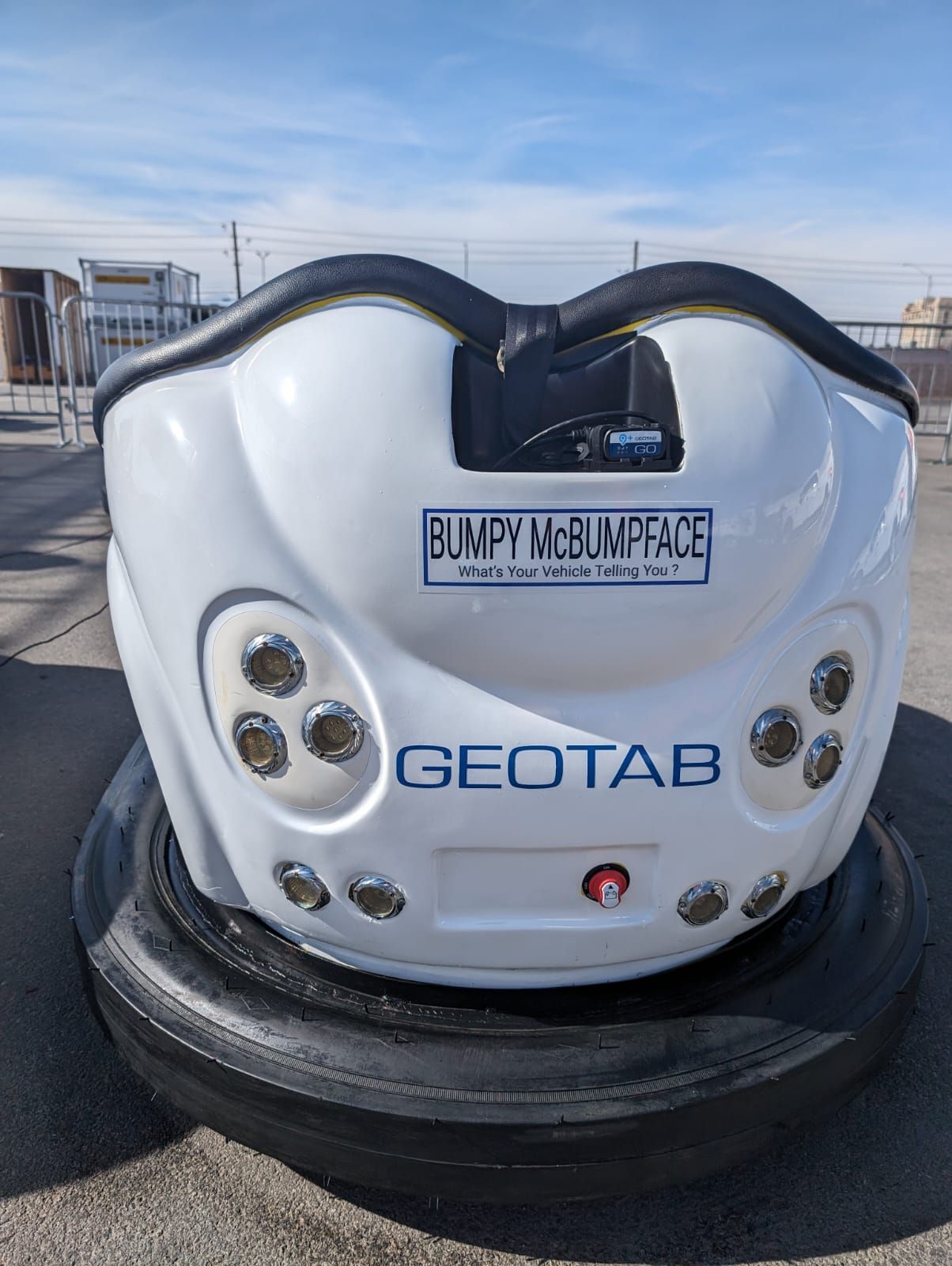 White Geotab bumper car at Geotab Connect