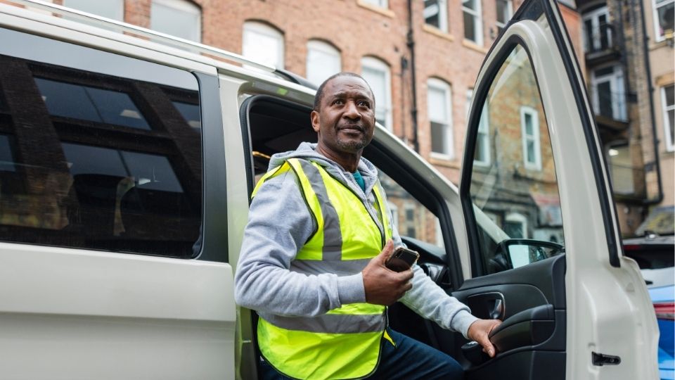 Man getting out of a truck