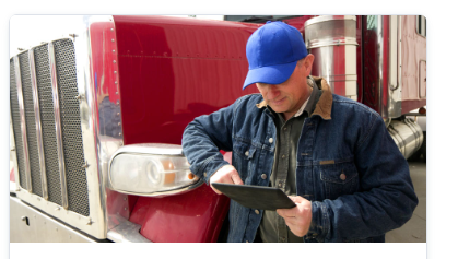driver looking at tablet