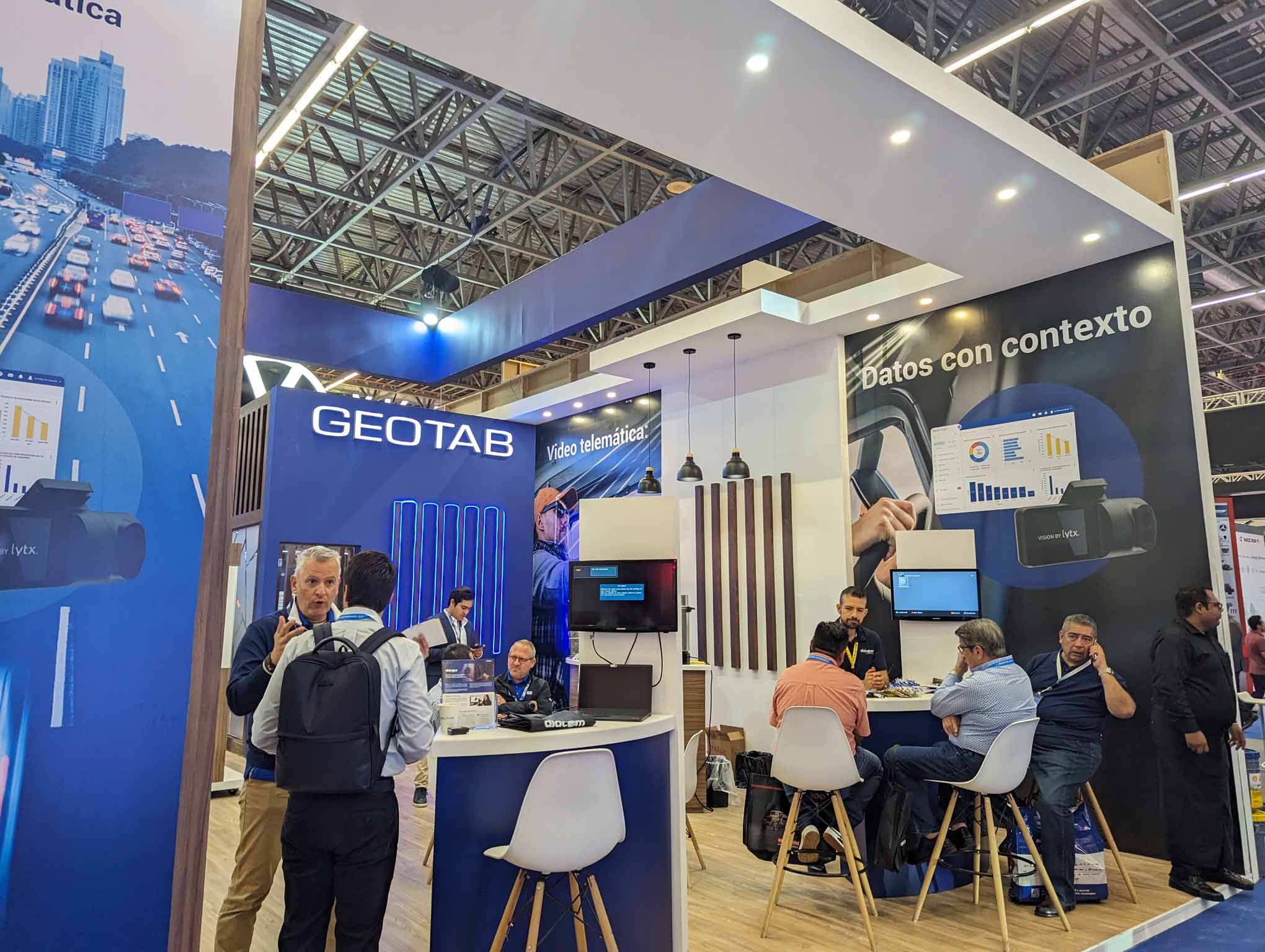 people arround geotab booth at expo transporte
