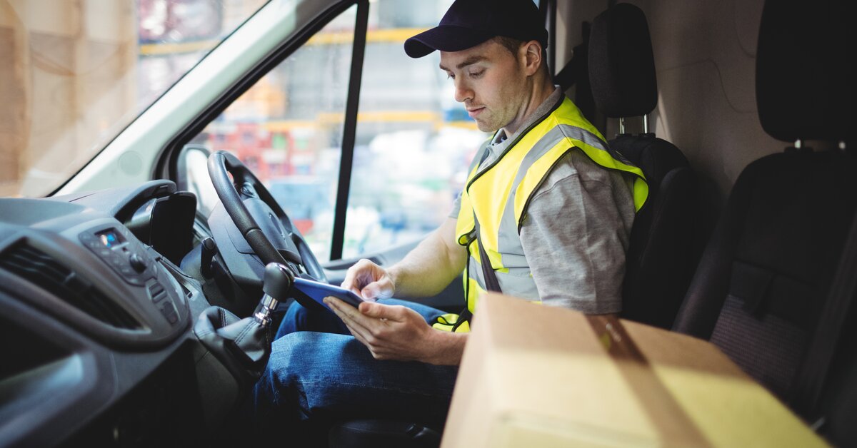 driver checking his device