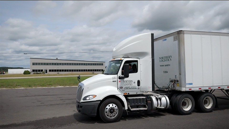 Northern Logistics truck in a parking lot