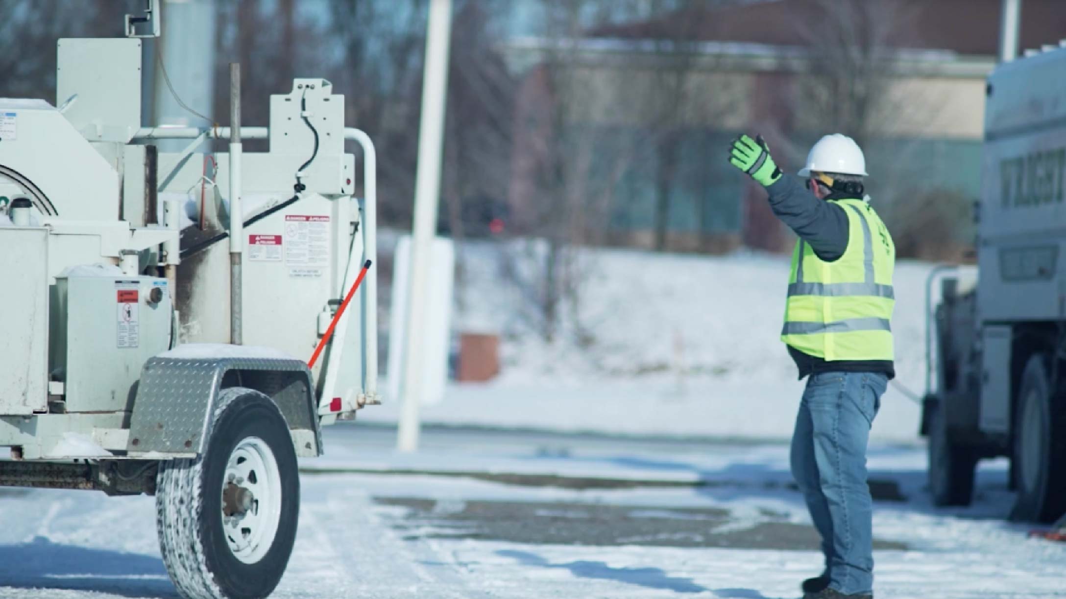 Person doing work outside on a snowy day