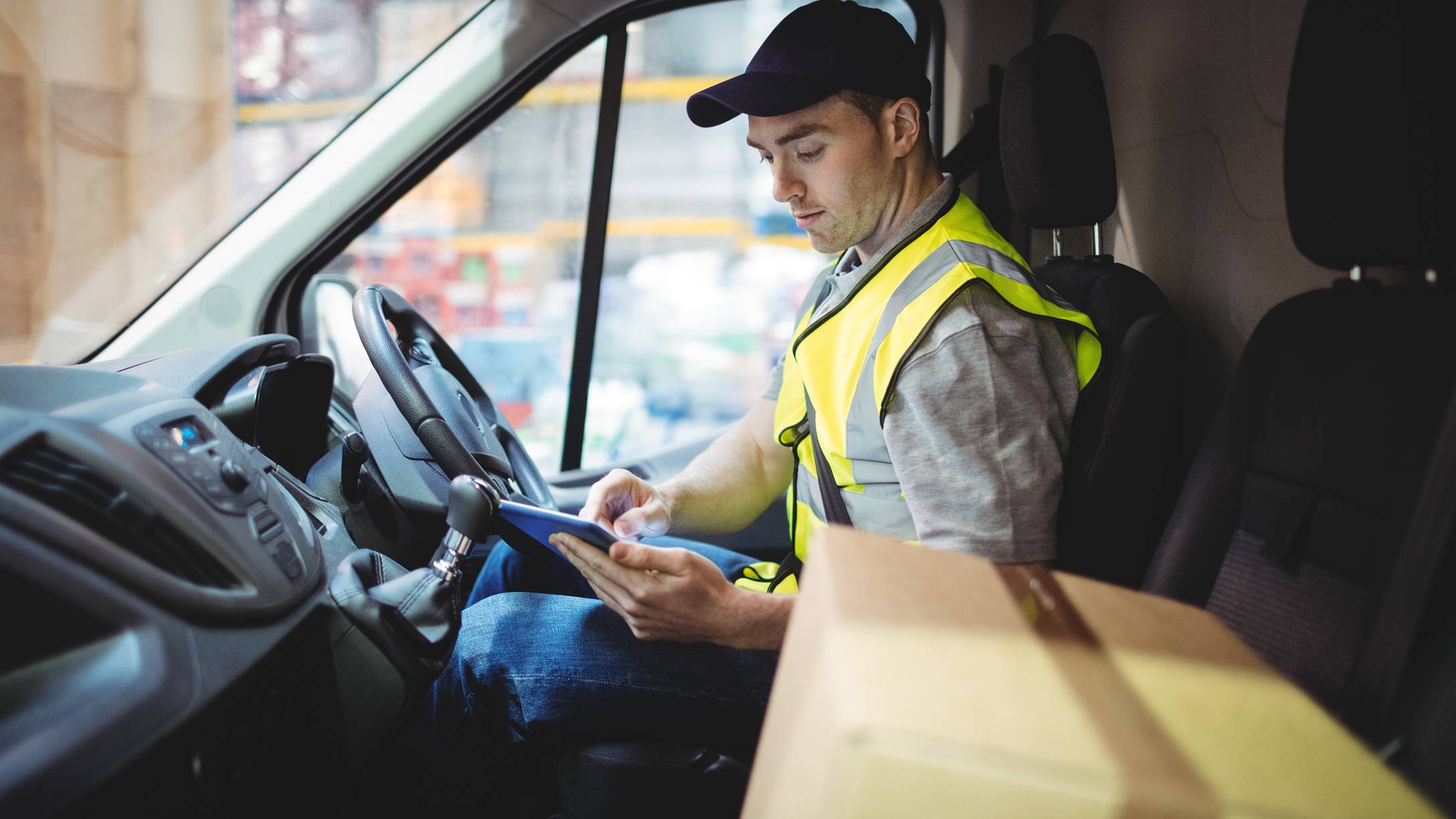 driver checking his device
